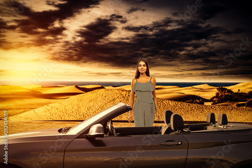 Slim young woman and summer car 