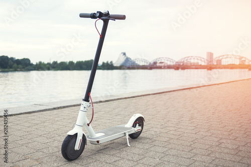 Electric scooter on the riverside