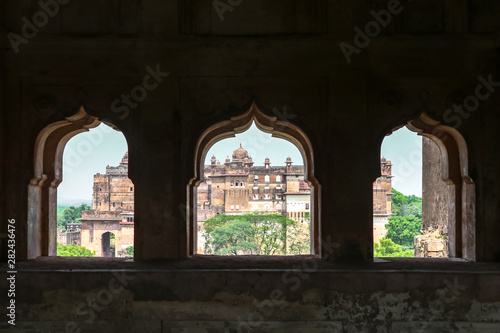 The Orchha Palace, seen through the windows of the Chaturbhuj Temple, Orchha, India