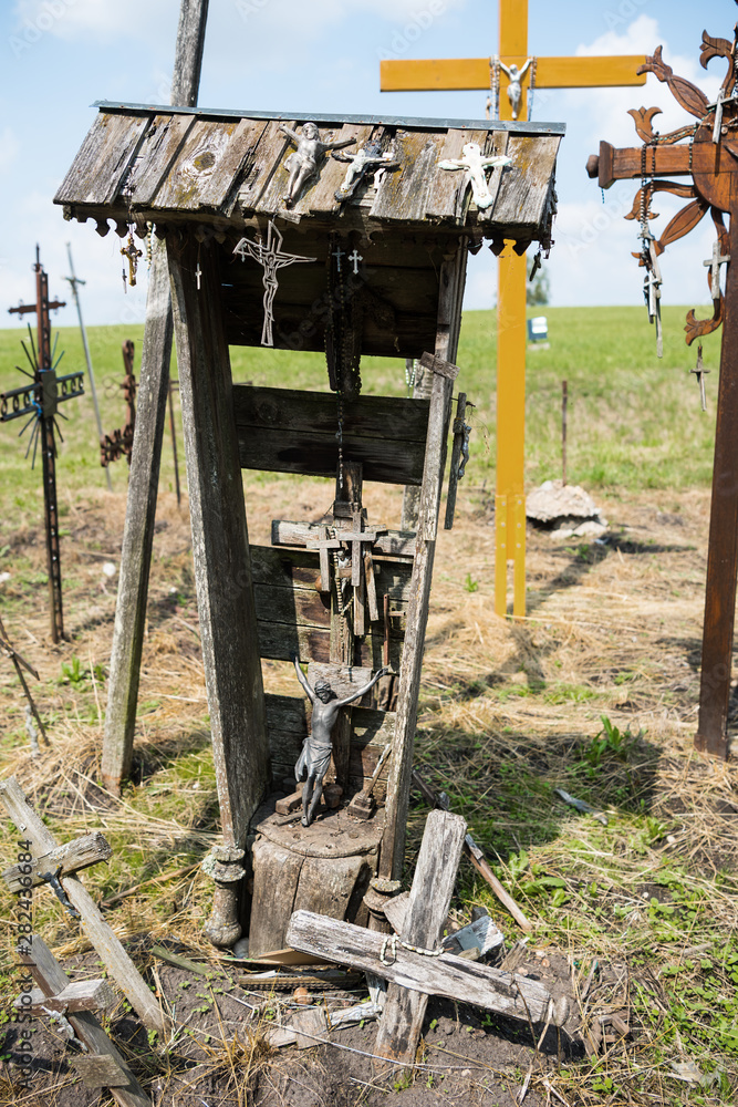 SIAULIAI, LITHUANIA - JULY 28, 2019:A large number of wooden crosses and crucifixes at the Hill of Crosses