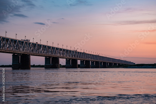 Bridge over the Amur river at sunset. Russia. Khabarovsk. Photo from the middle of the river. © rdv27