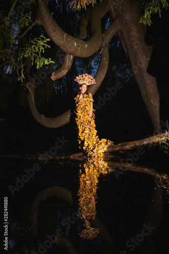 Fashion Autumn model, Fall Leaves Dress, Beauty Girl in kokoshniks photo