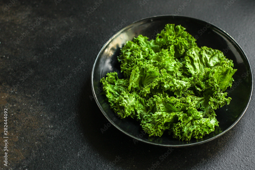 Healthy salad, leaves mix (green juicy snack). top food background - Image Healthy salad, leaves mix (green juicy snack). top food background - Image
