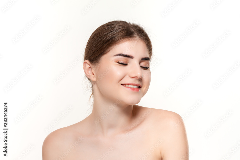 Close-up portrait of a happy beautiful young girl isolated over white background. Close-up portrait of a happy beautiful young girl isolated over white background.