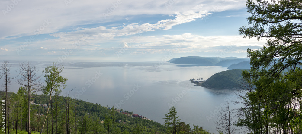 Russia, Irkutsk region, Listvyanka view of Lake Baikal from the mountain on a summer day