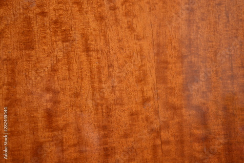 Brown dark lacquered wood background with gloss