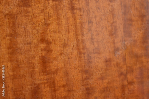 Brown dark lacquered wood background with gloss