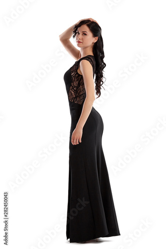 Full length portrait of a fashion model girl isolated on white background.