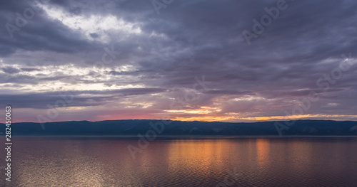 view of the gorgeous sunset from the island of Olkhon on Lake Baikal © ILIA