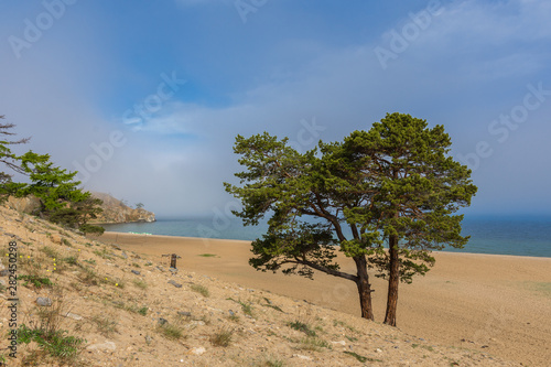 Beautiful view of Lake Baikal on a clear summer day from the shore of Olkhon Island