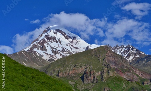 Beautiful Kazbek Mountain near Stepantsminda town. Georgian Valley.