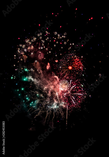 Celebration With Bright Colorful Fireworks Over Black Sky