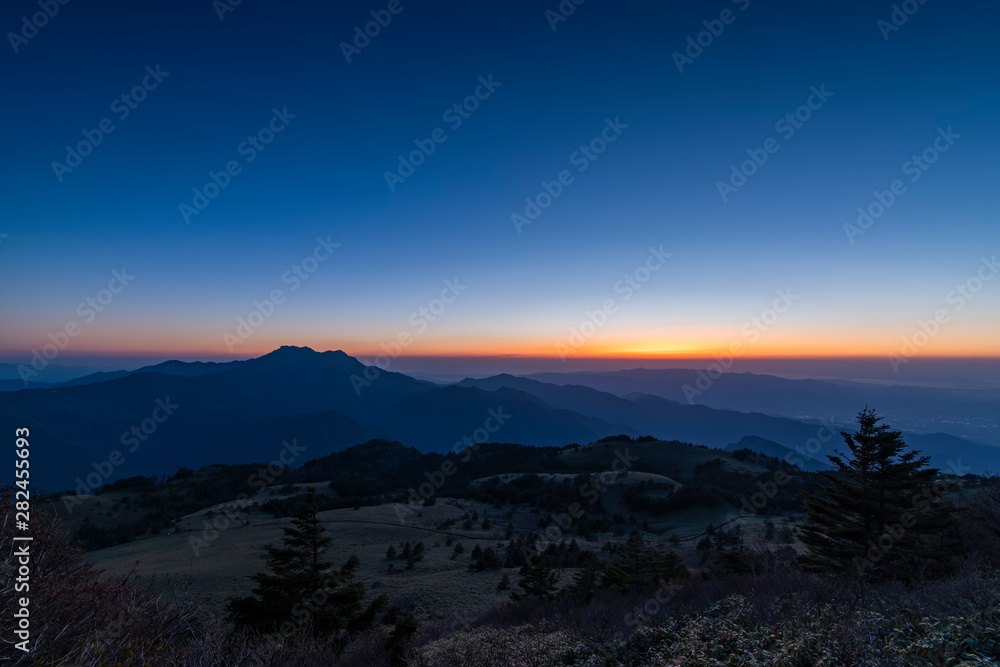 sunset in mountains during blue hour