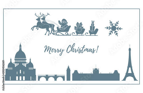 Santa Claus in sleigh with deers flying over Paris