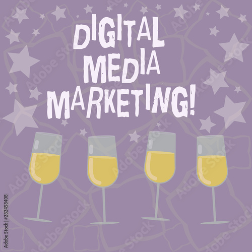 Writing note showing Digital Media Marketing. Business photo showcasing Use of numerous digital tactics and channels Filled Cocktail Wine Glasses with Scattered Stars as Confetti Stemware