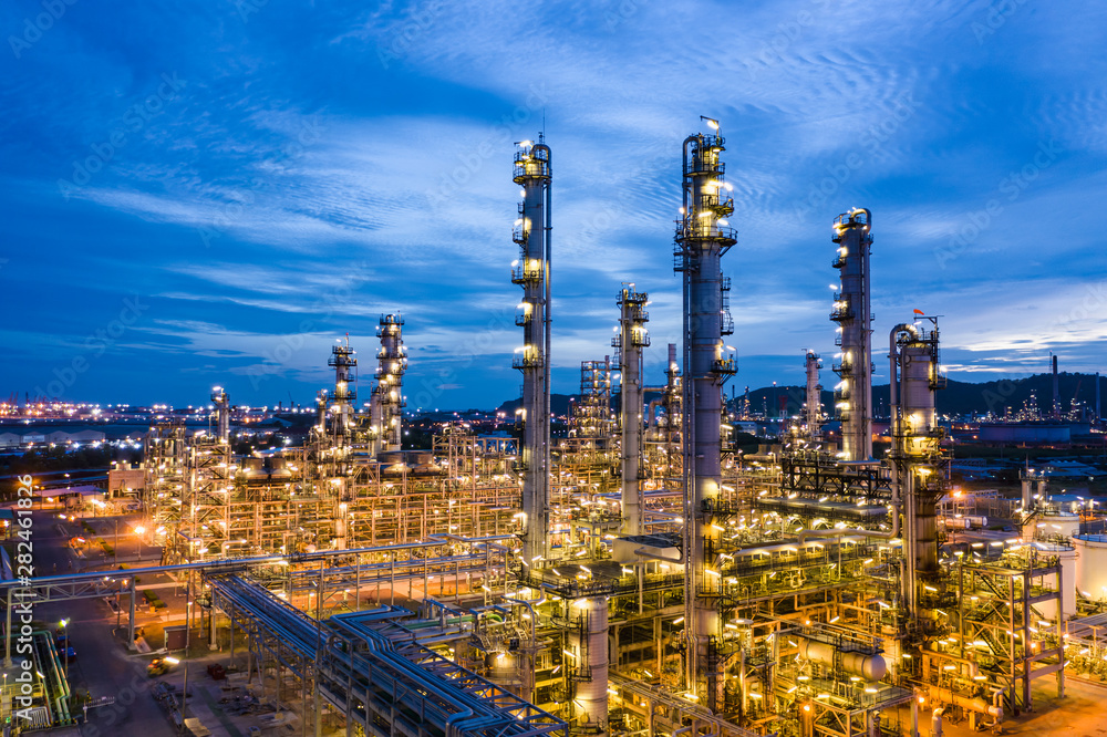 Fototapeta premium industrial oil and gas LPG refinery industry and commercial storage facilities import and export international by sea transport vessels