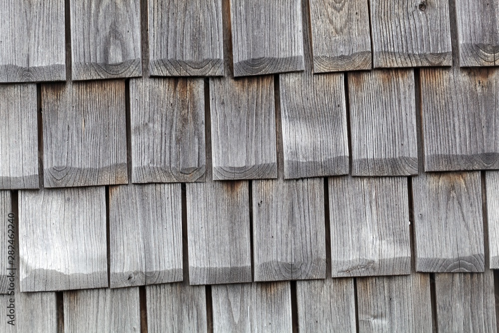 Wooden clapboards on a housewall Wooden clapboards on a housewall
