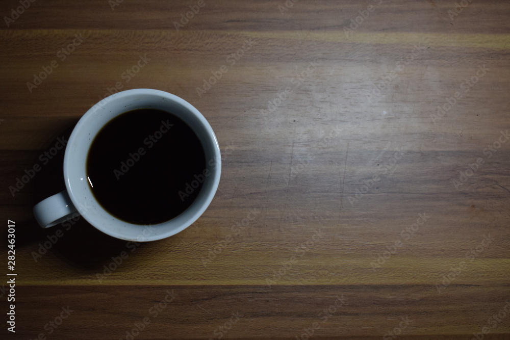 A Cup Of Coffee at Wooden Table Texture A Cup Of Coffee at Wooden Table Texture