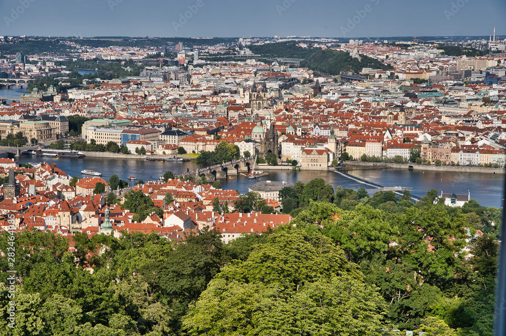 view of Prague old town, Charles bridge, St Vitus Cathedral and red roofs
