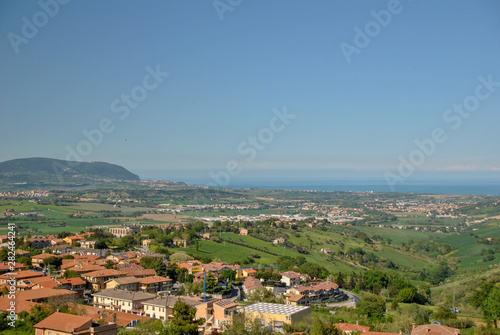 panoramic view of Recanati City in Italy with the sea © raffaellaweb