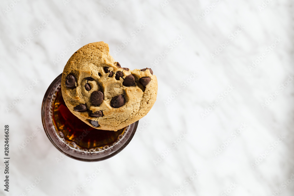 Cookie on the edge of the glass Cookie on the edge of the glass