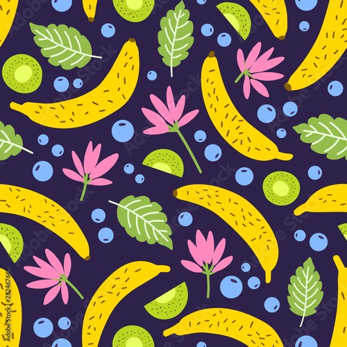 Seamless pattern with tropical blooming flowers and exotic fruits on dark bac...