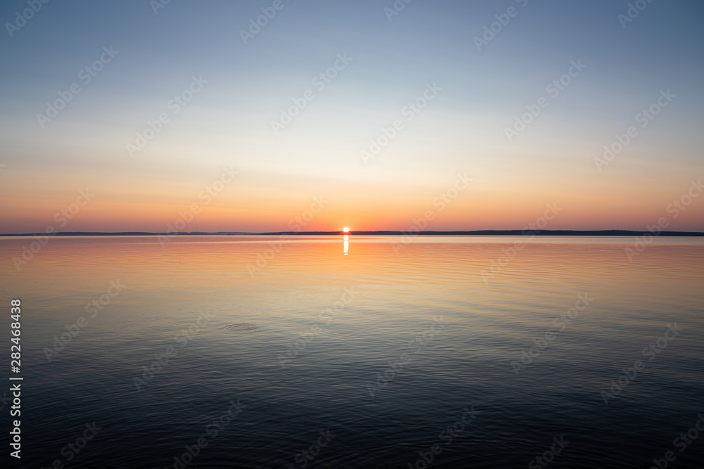 Calm serene sunrise lake scenery Calm serene sunrise lake scenery