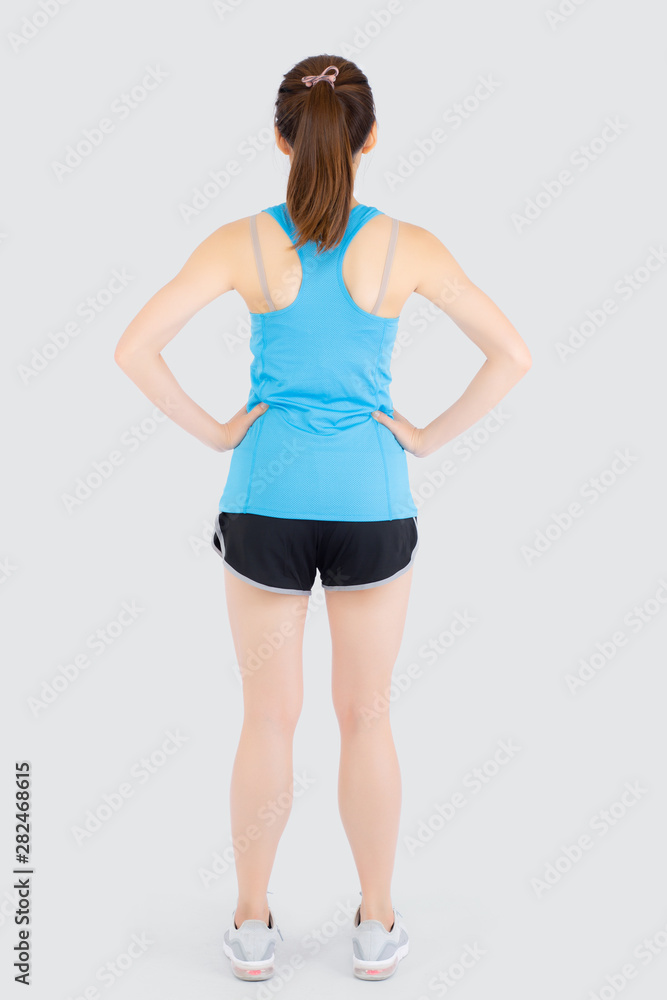 Beautiful portrait young asian woman in sport clothing with satisfied and confident isolated on white background, back of girl asia have shape and wellness, exercise for fit with health concept. Beautiful portrait young asian woman in sport clothing with satisfied and confident isolated on white background, back of girl asia have shape and wellness, exercise for fit with health concept.