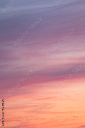 Colorful sunset clouds at dusk sky scape © Juhku