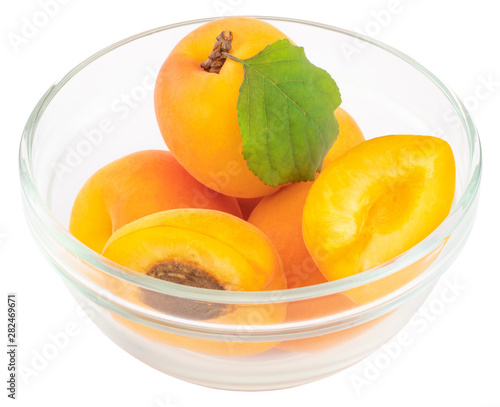 Isolated apricot. Bowl with fresh apricots on white background