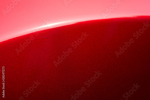 Obraz na płótnie Close up detail of red metallic paint coating car body