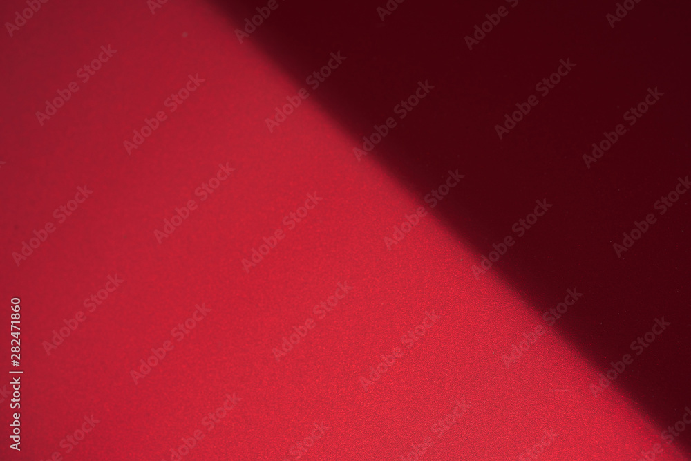 Close up detail of red metallic paint coating car body