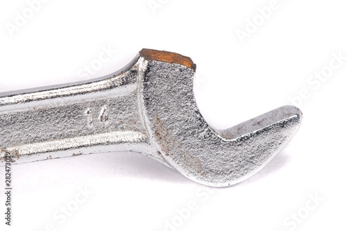 Close-up broken wrench isolated on white background