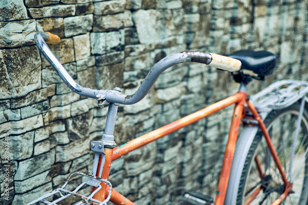Old bike on the street. Cycling, freedom of movement concept. Old bike on the street. Cycling, freedom of movement concept.