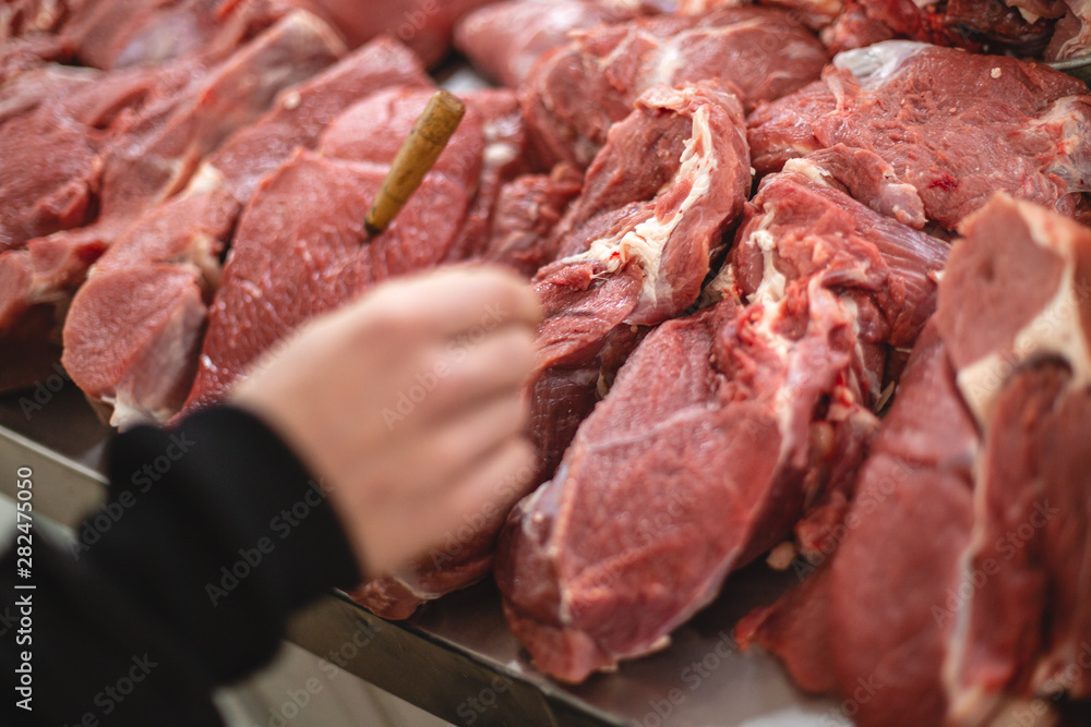 selective focus photo from the natural home market with meat horned animals