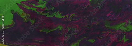 abstract marbleized effect background. purple, green and black creative colors. banner