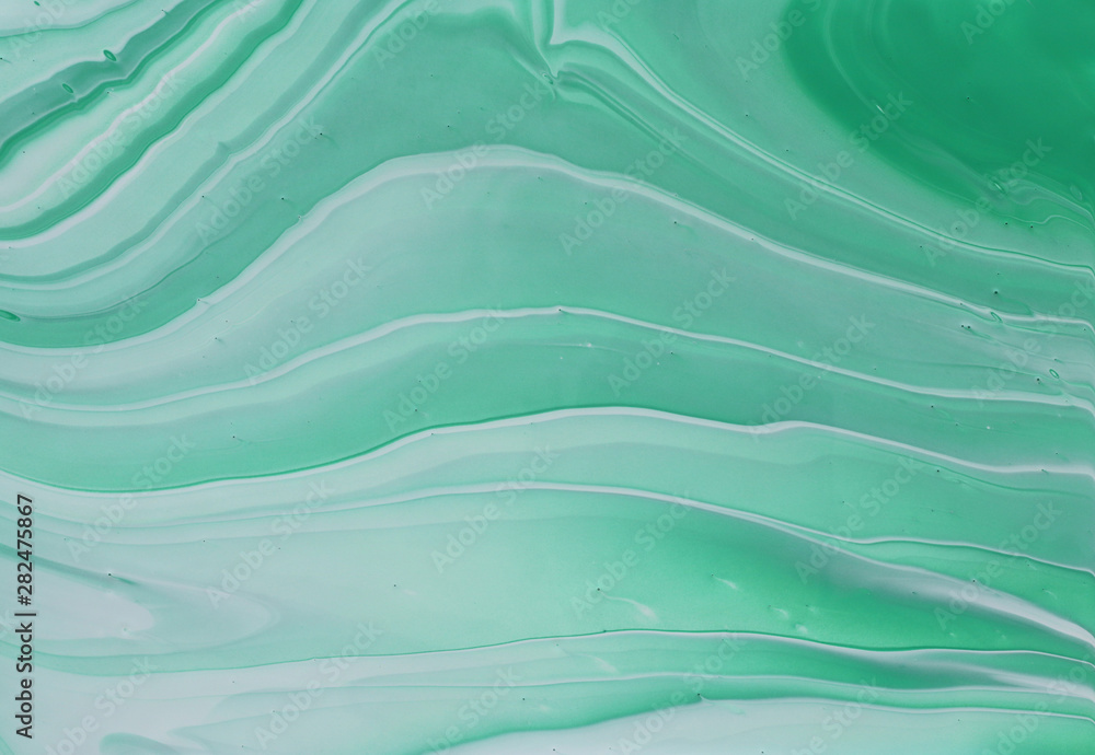 Fototapeta premium photography of abstract marbleized effect background. emerald, green, mint and white creative colors. Beautiful paint.