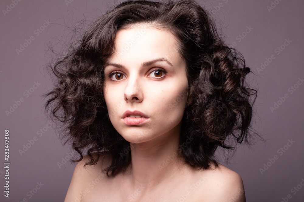 Naklejka premium beautiful young curly girl portrai