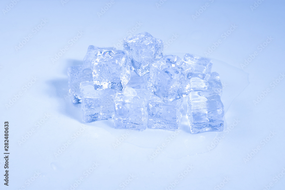 Obraz premium Ice crystal cubes, space for text or design.