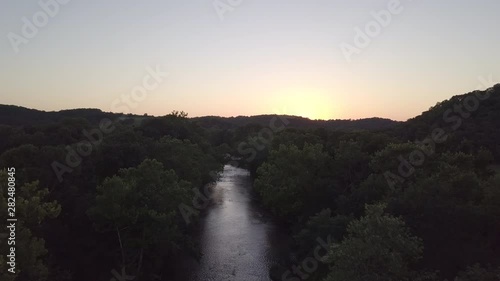Missouri Ozark river at sunset during the summer