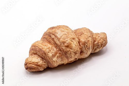 Fresh and tasty buttery croissants isolate on white background.