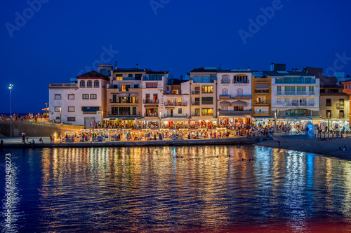 L escala  Costa Brava  Spain  July 24 2019 nightscene of the old harbour area with an evening market with bars and restuarants
