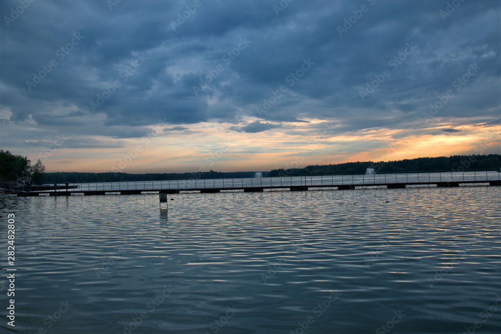 Fototapeta premium sunset over the lake