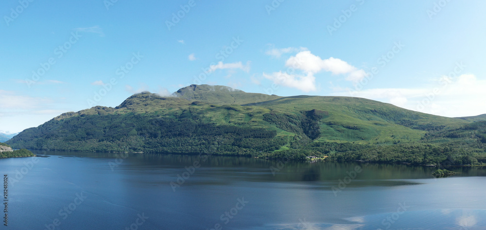 Fototapeta premium Ben Lomond rising above Loch Lomond
