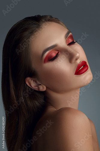 Close-up portrait of a beautiful fashion model with professional make-up.