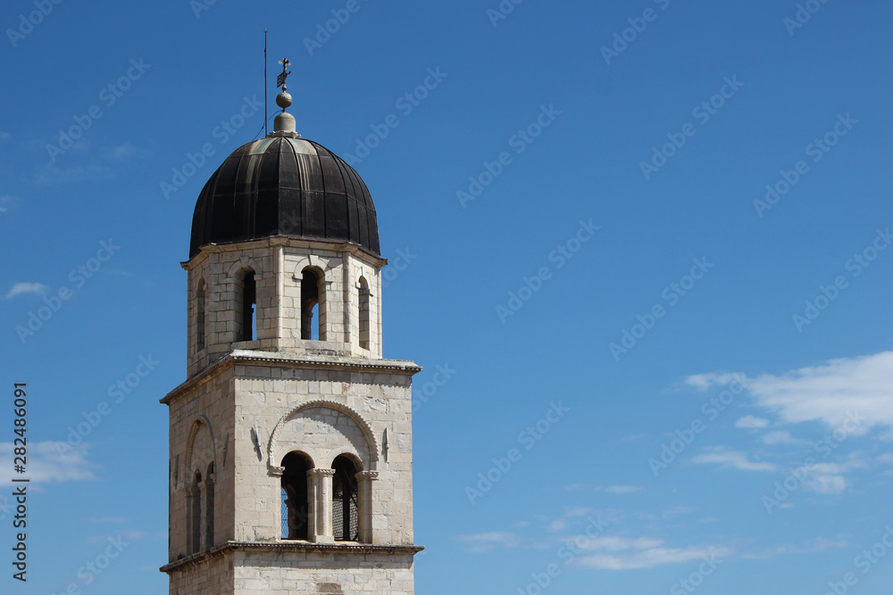 Franciscan Church and Monastery bell tower close up, Dubrovnik main street, Croatia