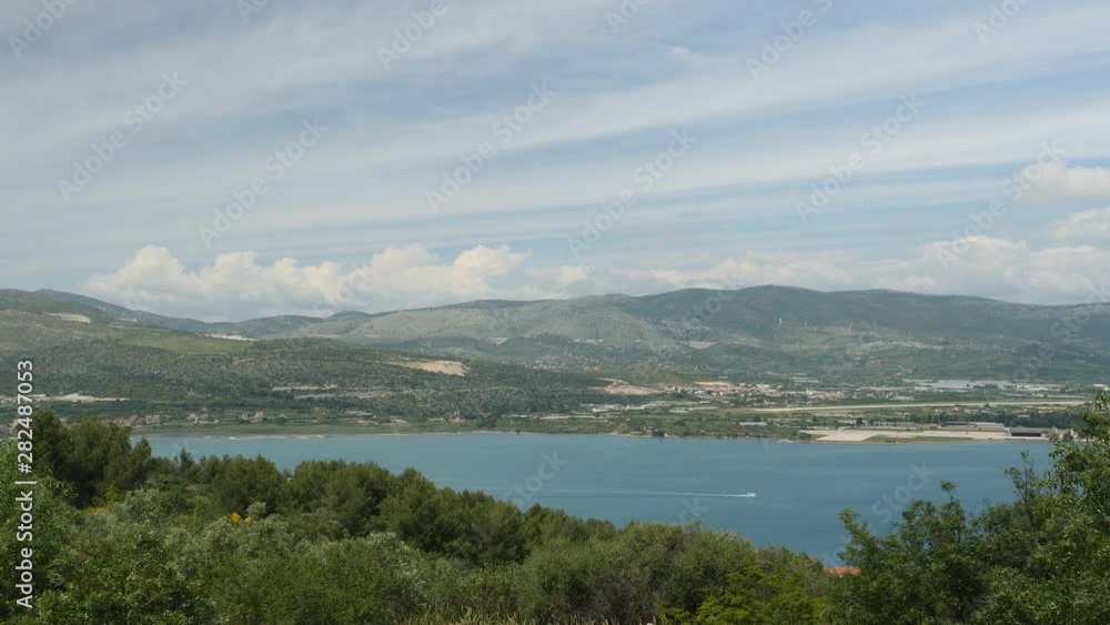 Landscape of green hills and sea in Dalmatia county, Croatia.