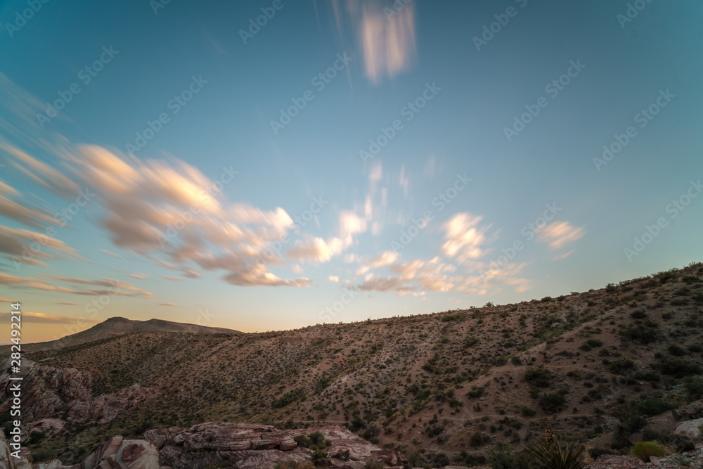 Desert landscapes with dramatic skies at dusk golden hour Desert landscapes with dramatic skies at dusk golden hour