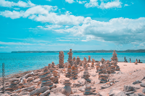 Stone stacked at the beach of Burias Island, Philippines photo