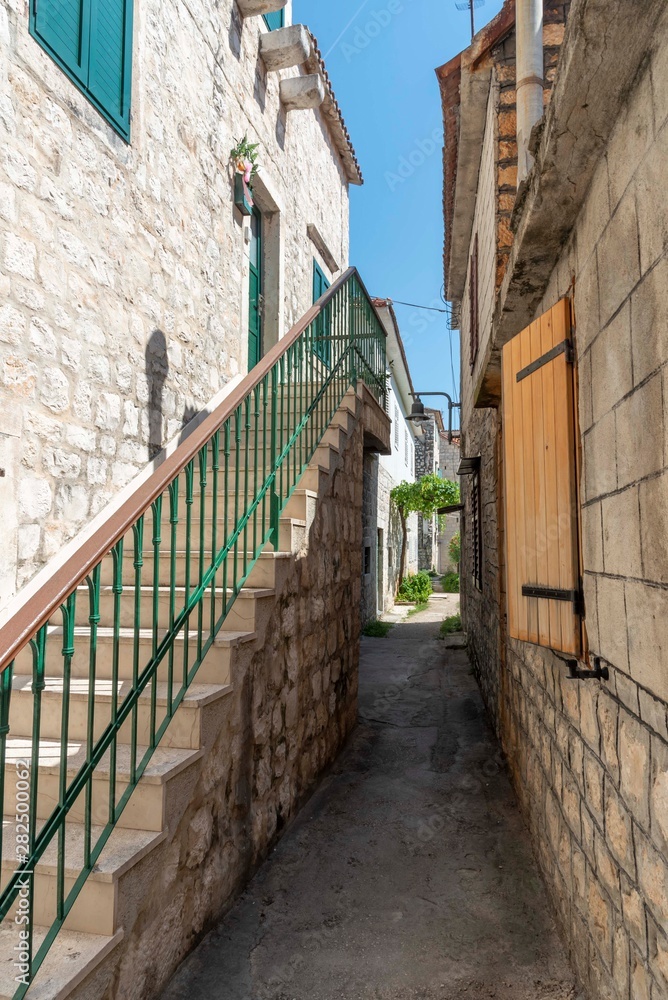 Old alley in Trogir in Croatia